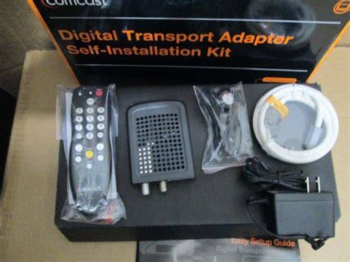 How do I reset my Comcast digital adapter?