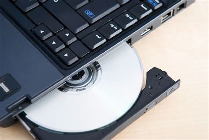 How do you open the CD drive on a government laptop 2019?